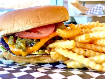 Burger & french fries At Mark of the Beastro In Salt Lake City