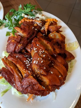 Roast pork At Utopia Vegan In Dickson
