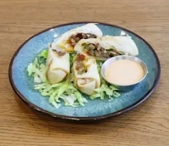 Steak & Cheese Roll At Chun Vegetarian In Brooklyn