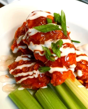 fried chicken wings At Parlor City Vegan In Binghamton